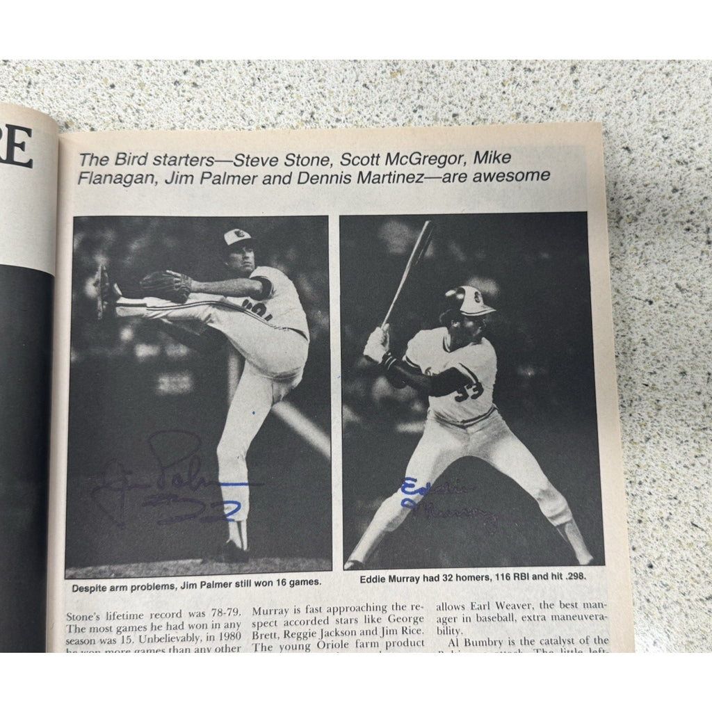 Inside spread from 1980 Popular Sports Baseball magazine featuring MLB player statistics and signatures