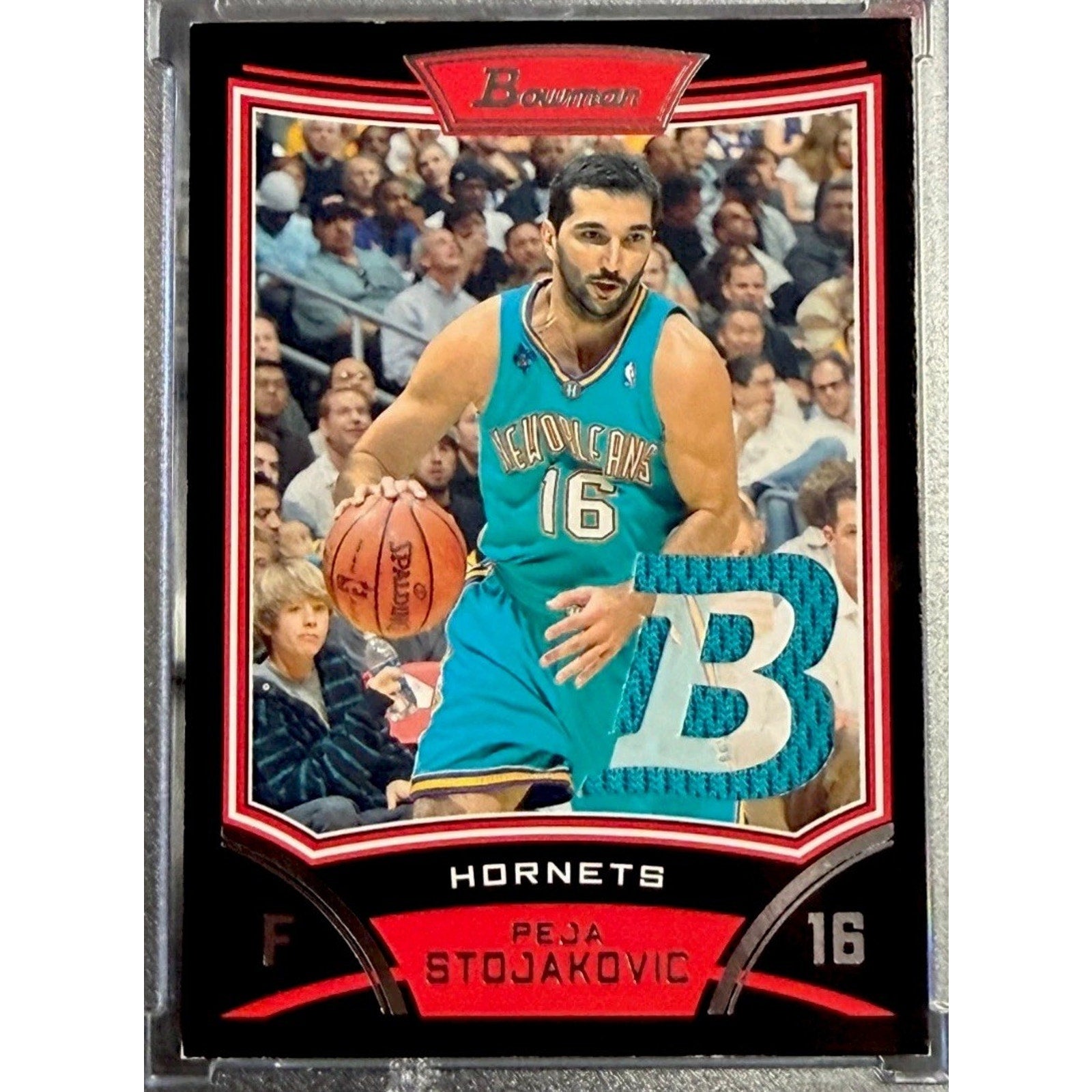 2008-09 Bowman Draft Picks & Stars Peja Stojakovic game-used jersey relic card featuring New Orleans Hornets sharpshooter