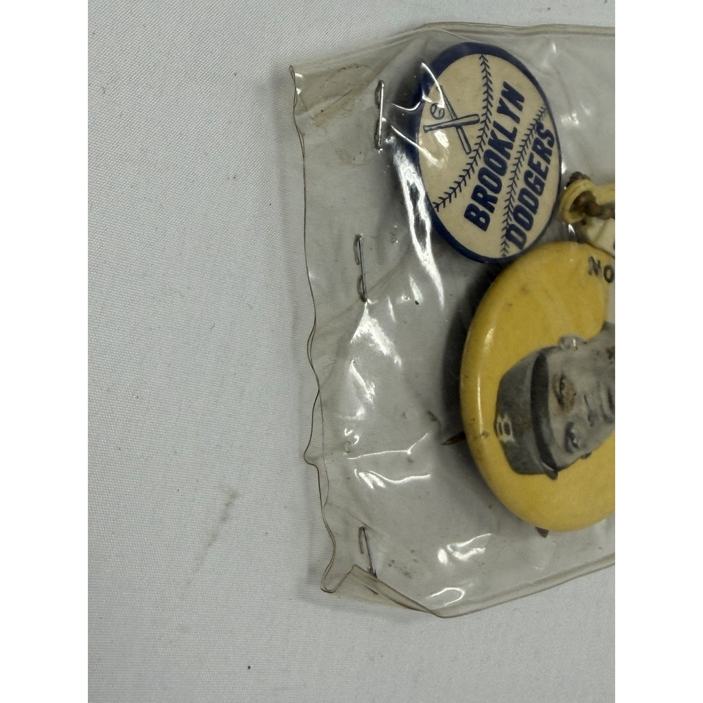 Side angle of sealed Jackie Robinson Brooklyn Dodgers vintage pin set
