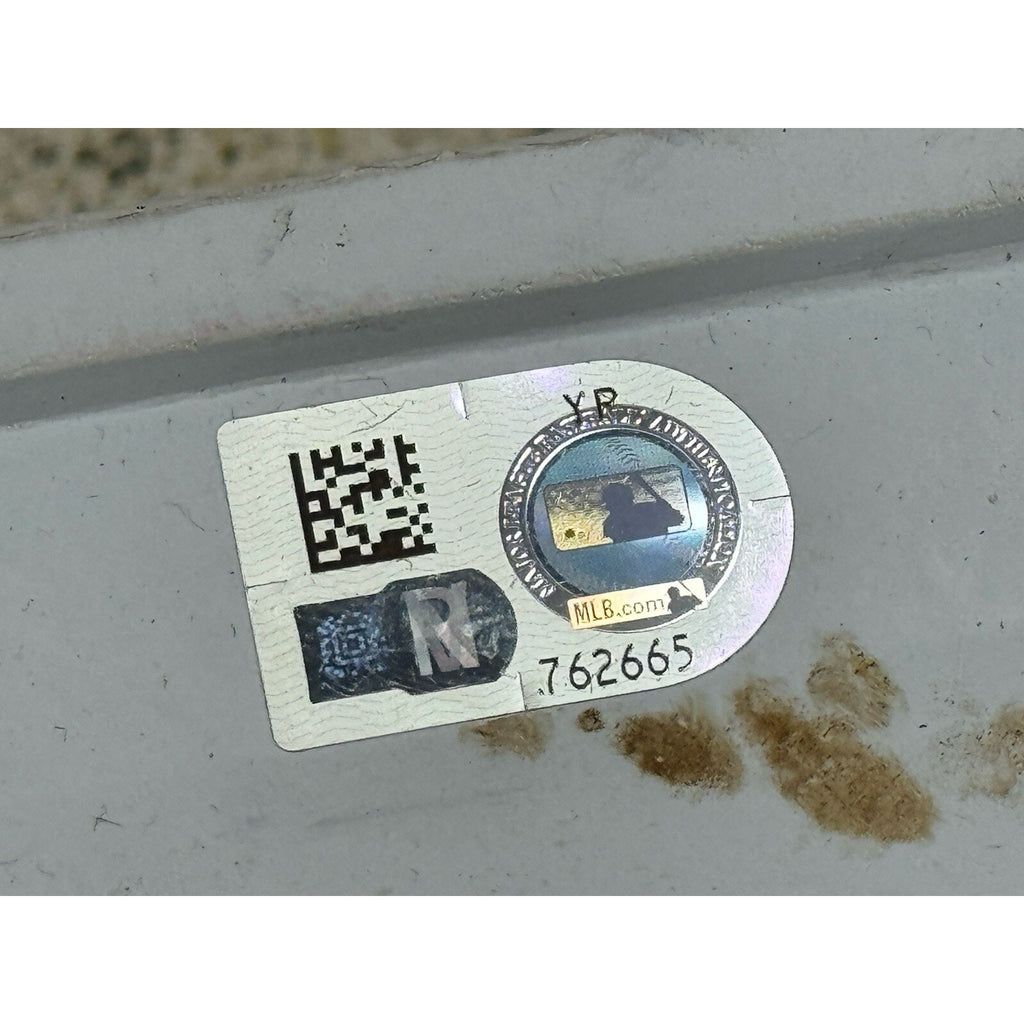 MLB authentication sticker close-up on Baltimore Orioles game used third base collectible